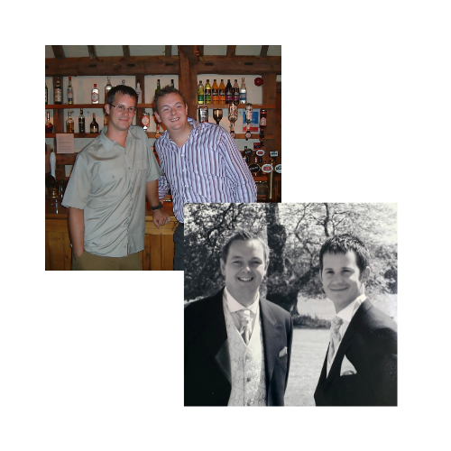 Three men are posing for a picture in front of a bar