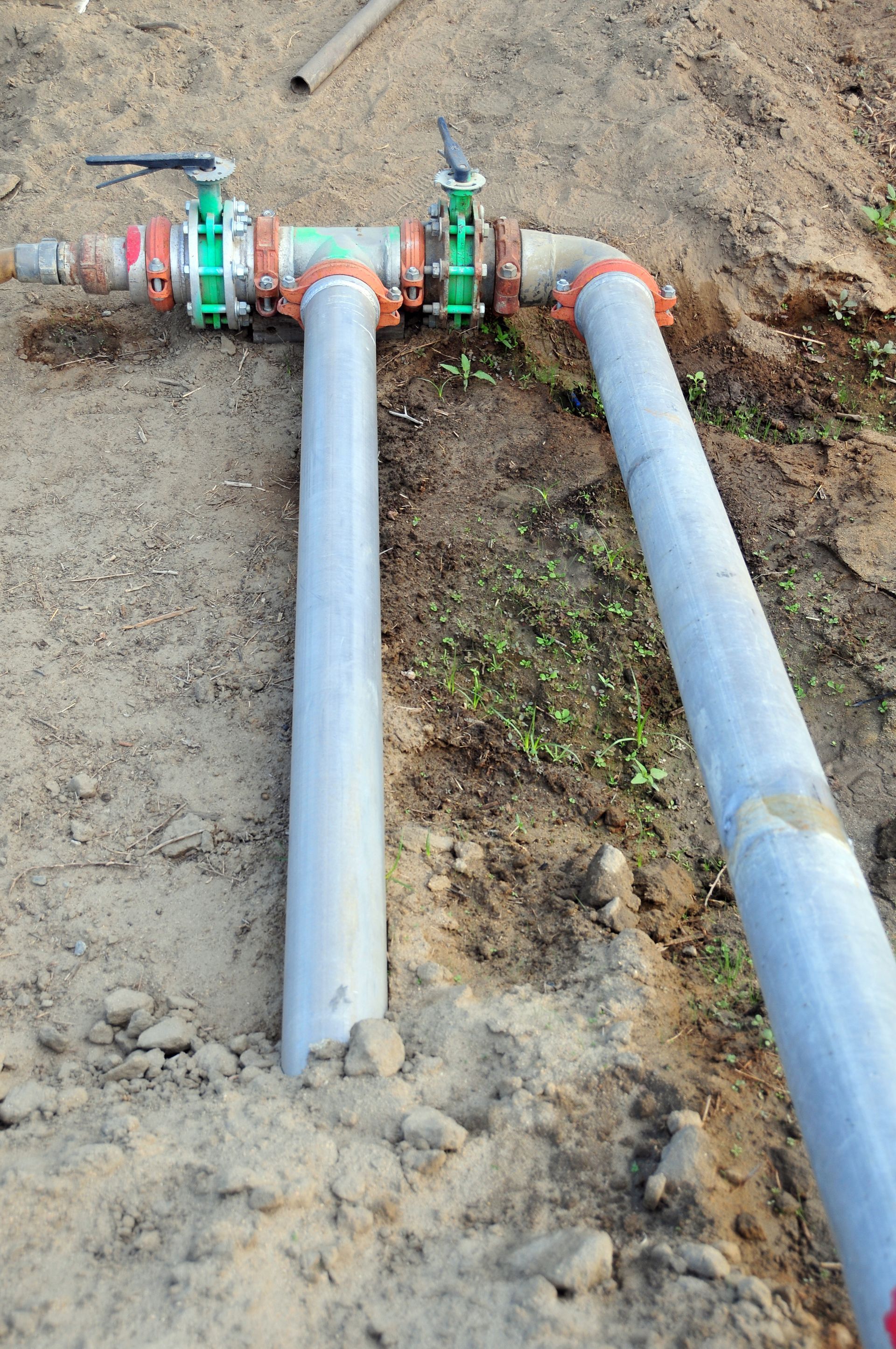Pipes and valves installed in the ground; irrigation system.
