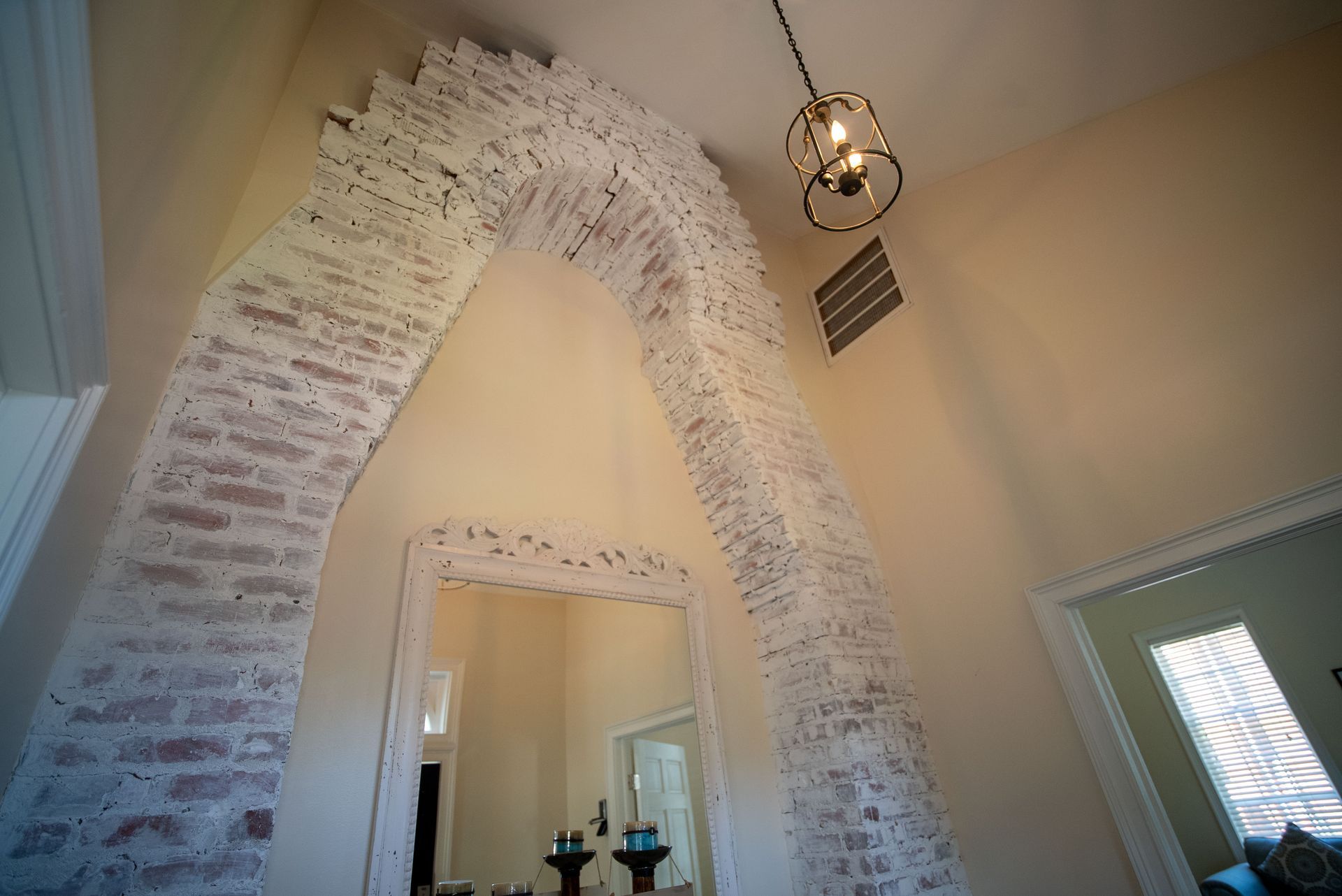 there is a large mirror in the middle of the room .