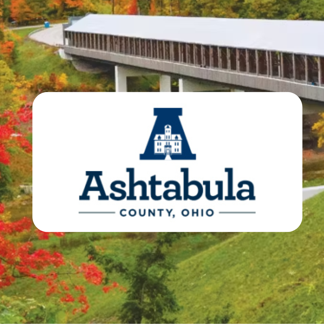 A logo for ashtbula county ohio with a bridge in the background