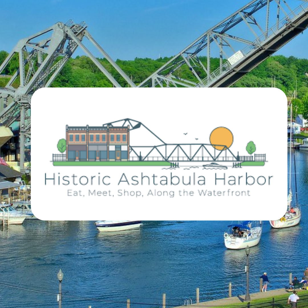 A logo for historic ashtakula harbor with boats in the water