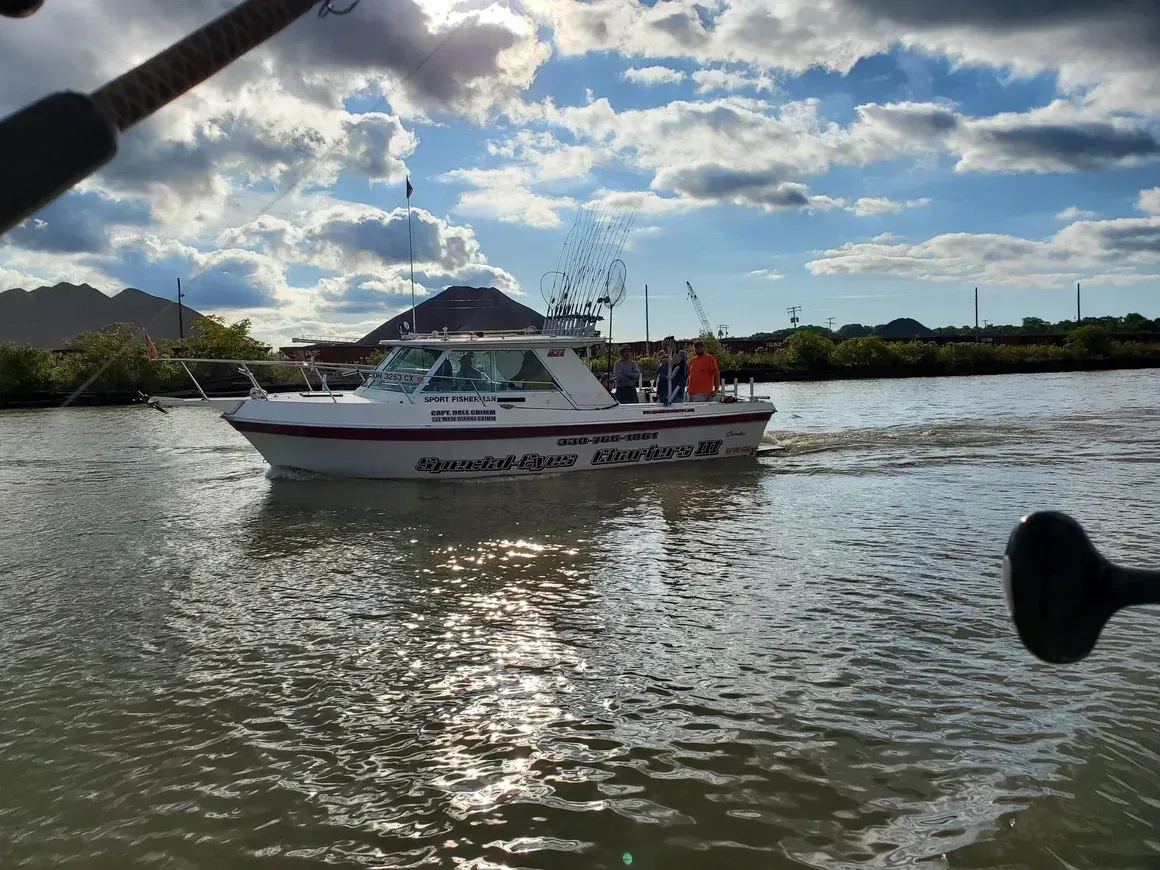 A boat with the word aquatic on the side of it