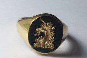 family crest signet ring hand engraved by The Master Hand Engraver