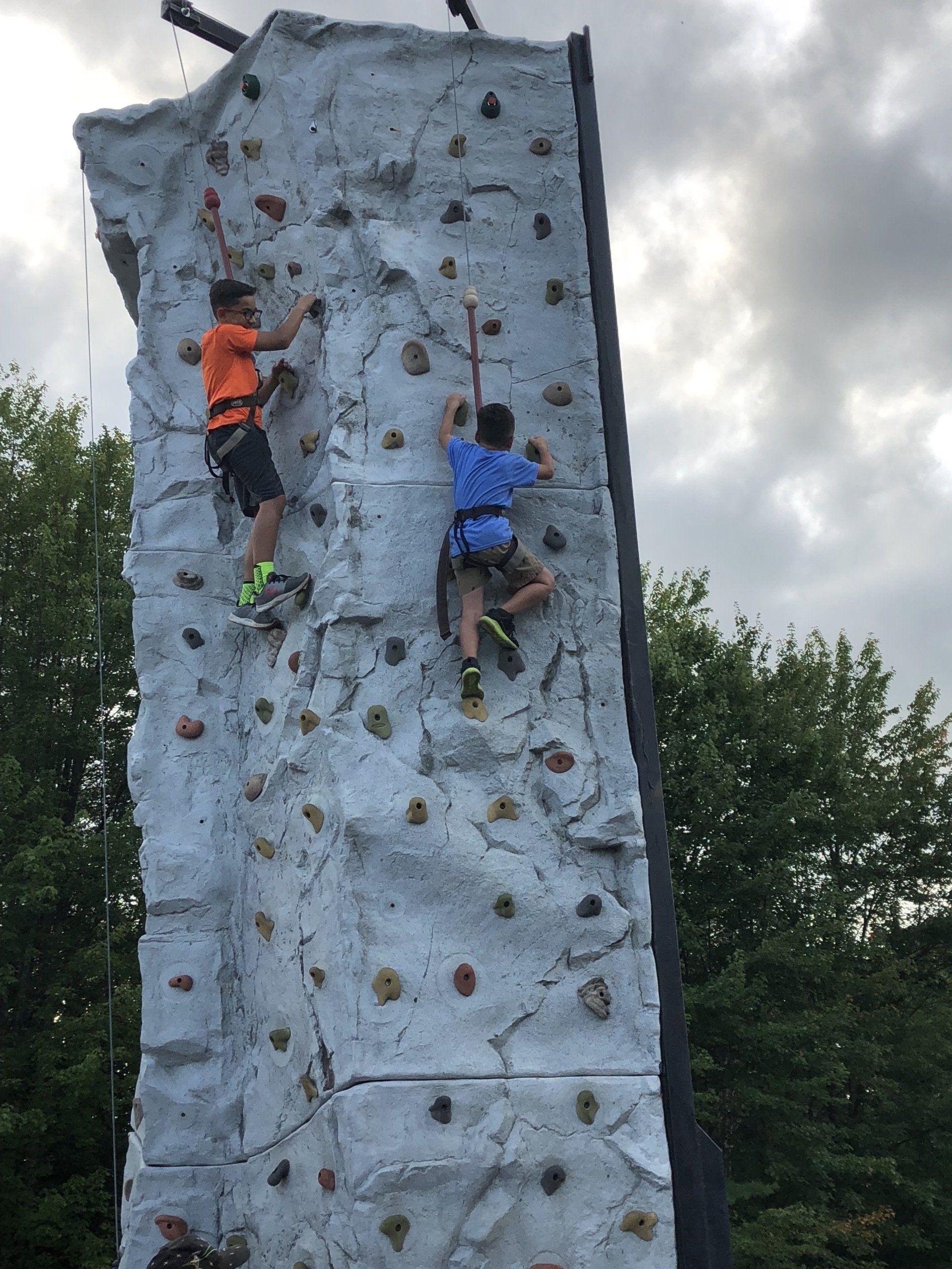 Boys Enjoying on The Top of The Rock Wall Event — Chicopee, MA — Cliffhangers Portable Rock Climbing Wall