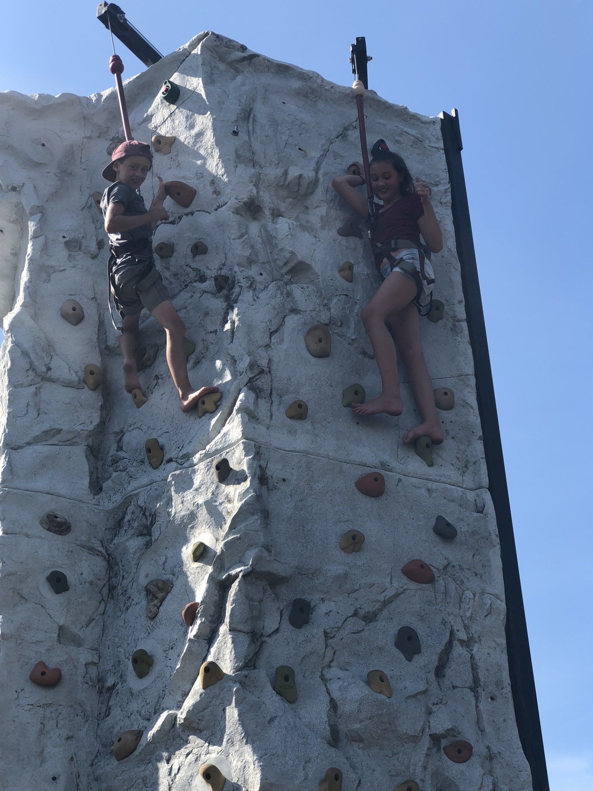 Children Smile After Reaching The Top of the Rock Wall — Chicopee, MA — Cliffhangers Portable Rock Climbing Wall