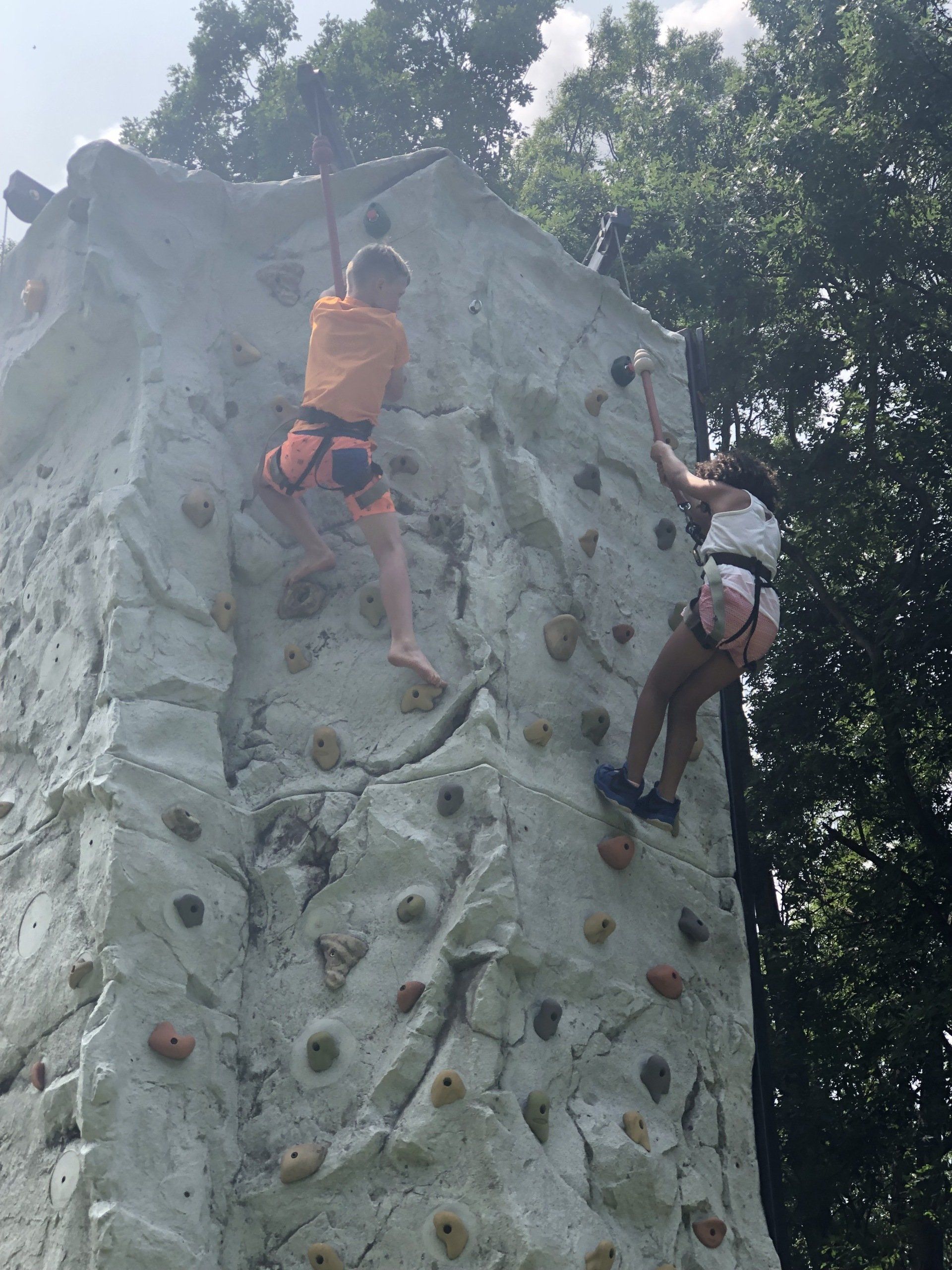 Children Enjoying on The Top of Rock Wall Climbing — Chicopee, MA — Cliffhangers Portable Rock Climbing Wall