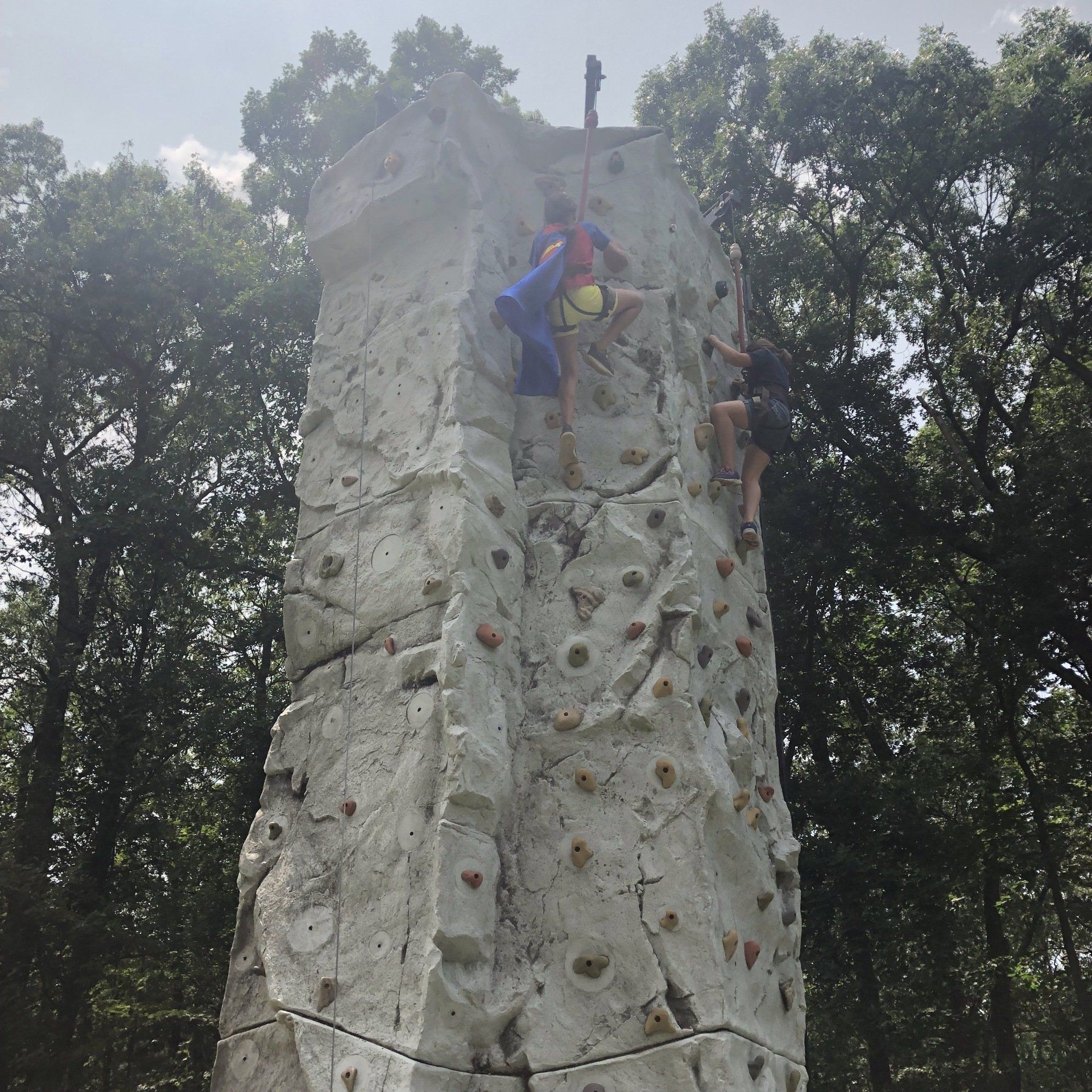 Two Girls Climb on The Rock Wall Climbing — Chicopee, MA — Cliffhangers Portable Rock Climbing Wall