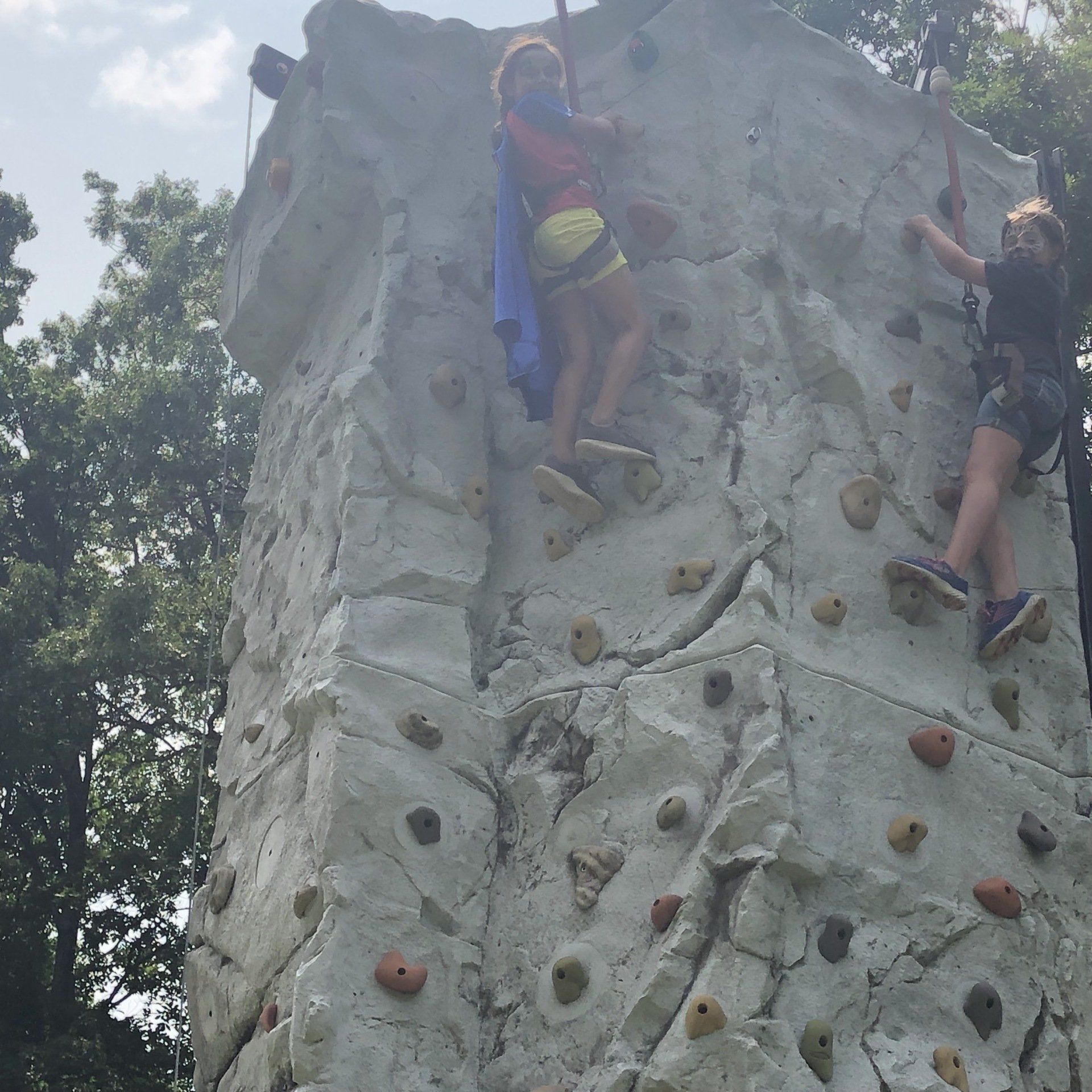 Two Girls Wearing Make Up While Climbing — Chicopee, MA — Cliffhangers Portable Rock Climbing Wall
