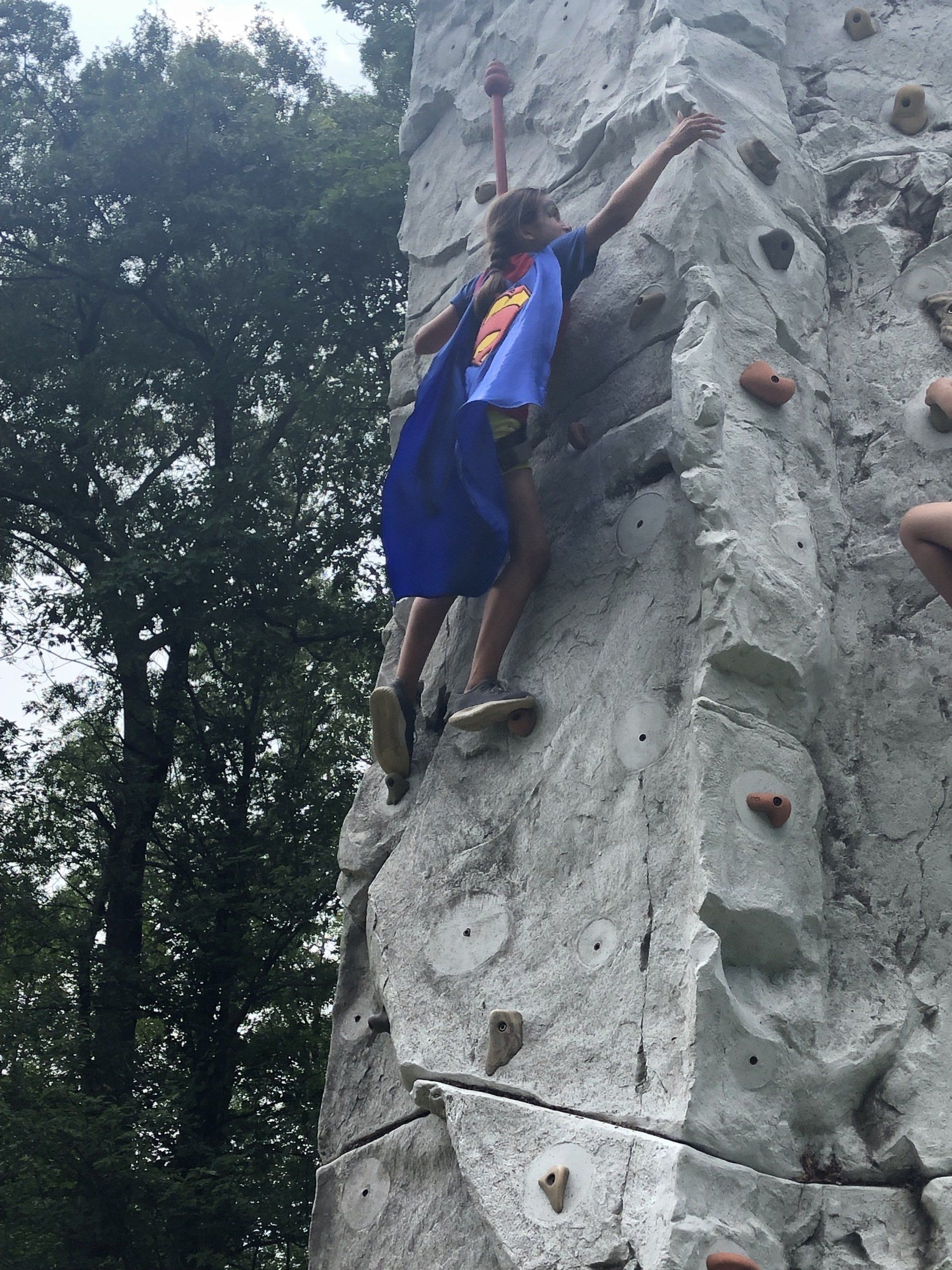 Girl Has Strong Hands While Climbing — Chicopee, MA — Cliffhangers Portable Rock Climbing Wall