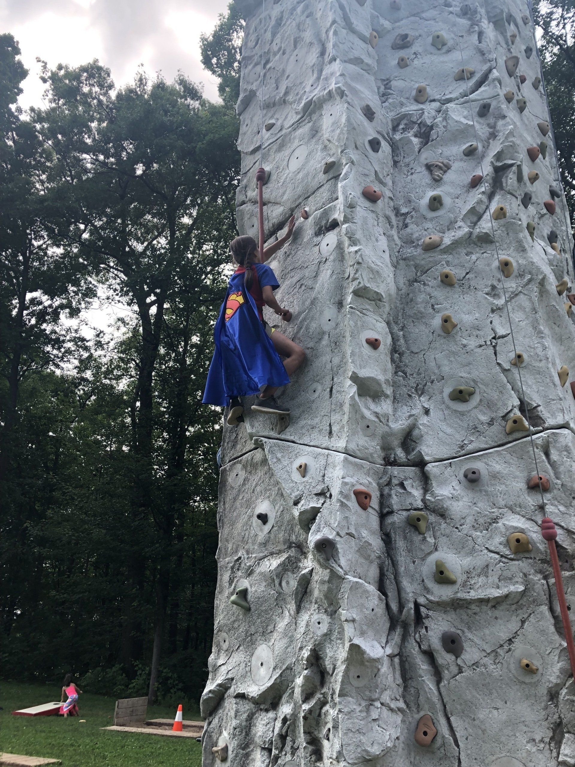 Girl Climbing on The Rock Wall — Chicopee, MA — Cliffhangers Portable Rock Climbing Wall