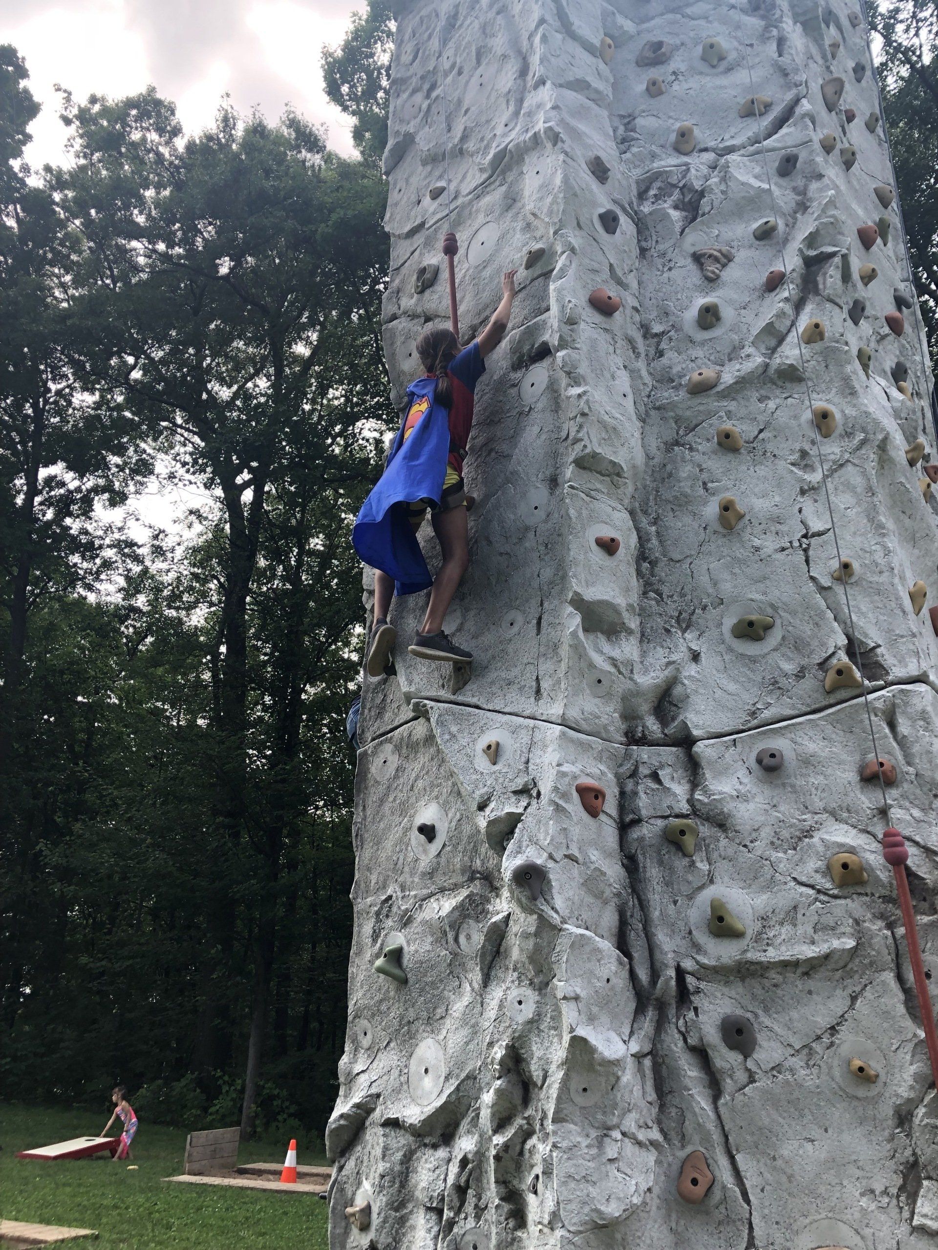Girl Keep Reaching the Top of The Climbing Wall — Chicopee, MA — Cliffhangers Portable Rock Climbing Wall