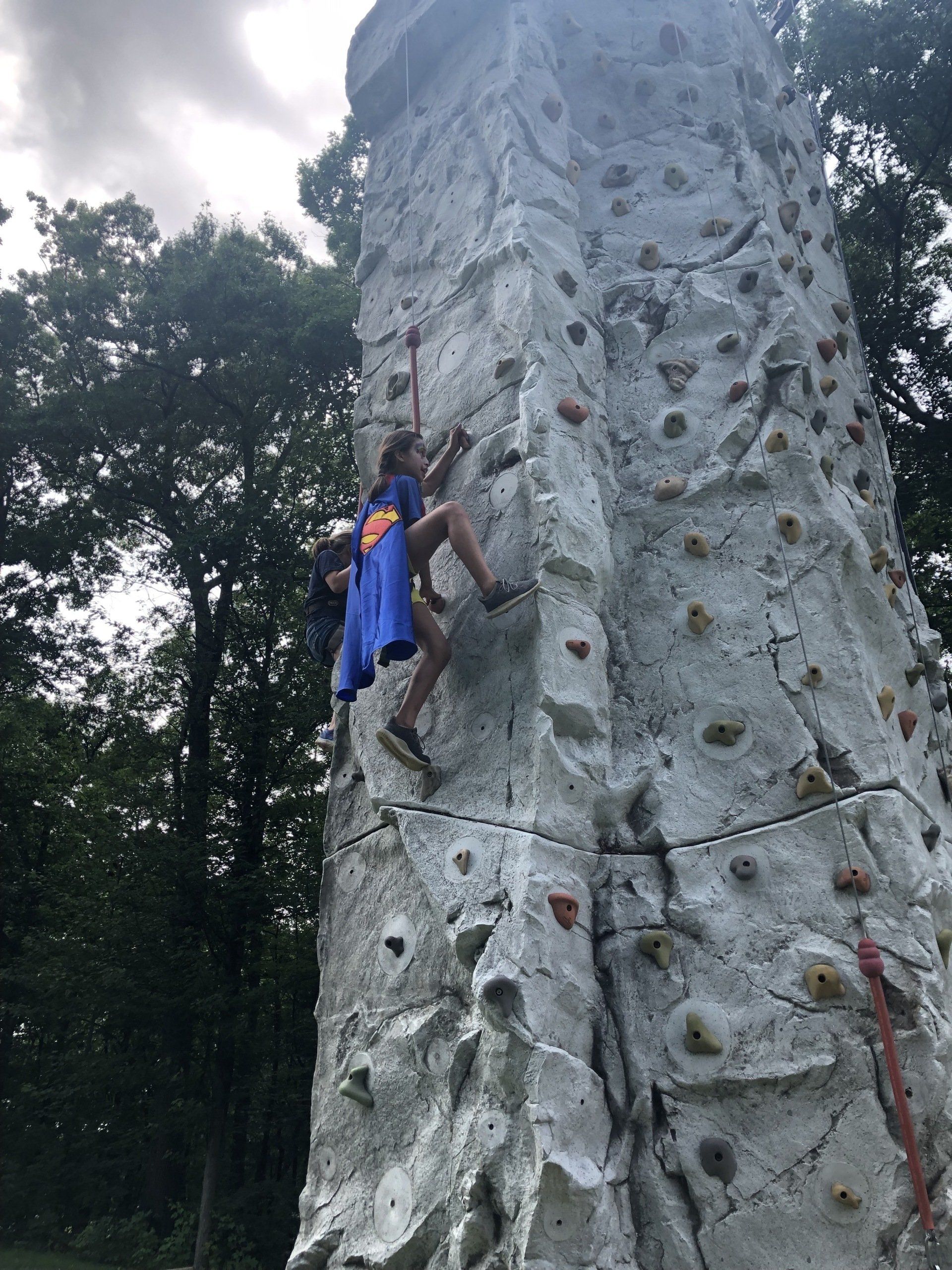 Girl Enjoy Climbing the Rock Wall — Chicopee, MA — Cliffhangers Portable Rock Climbing Wall