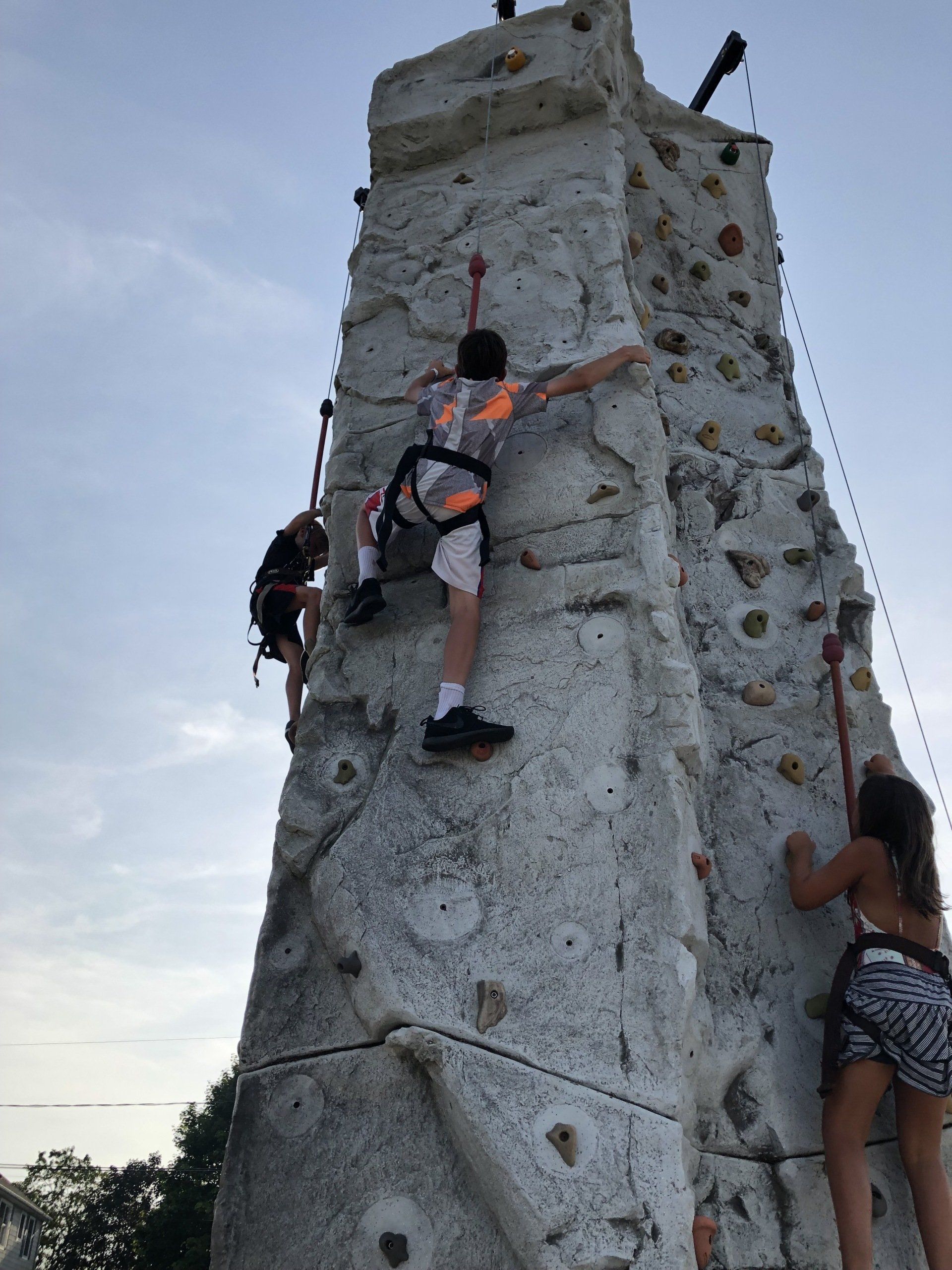 Boy Reached the Top of The Climbing Wall — Chicopee, MA — Cliffhangers Portable Rock Climbing Wall