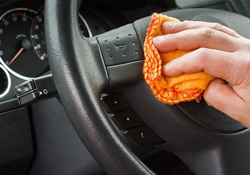 Steering Wheel being Cleaned — Full Service Car Wash in Lake Oswego, OR