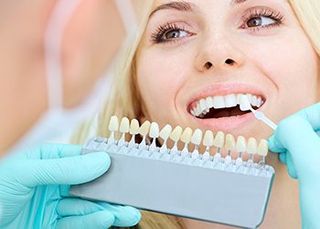 Teeth Whitening — Woman with a Beautiful Smile at the Dentist in Colorado Springs, CO