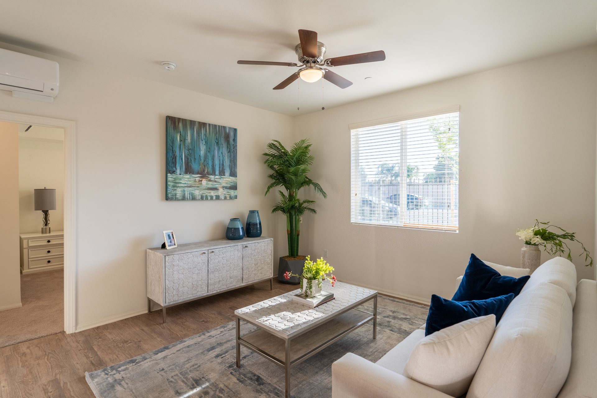 Living room with couch and picture on wall