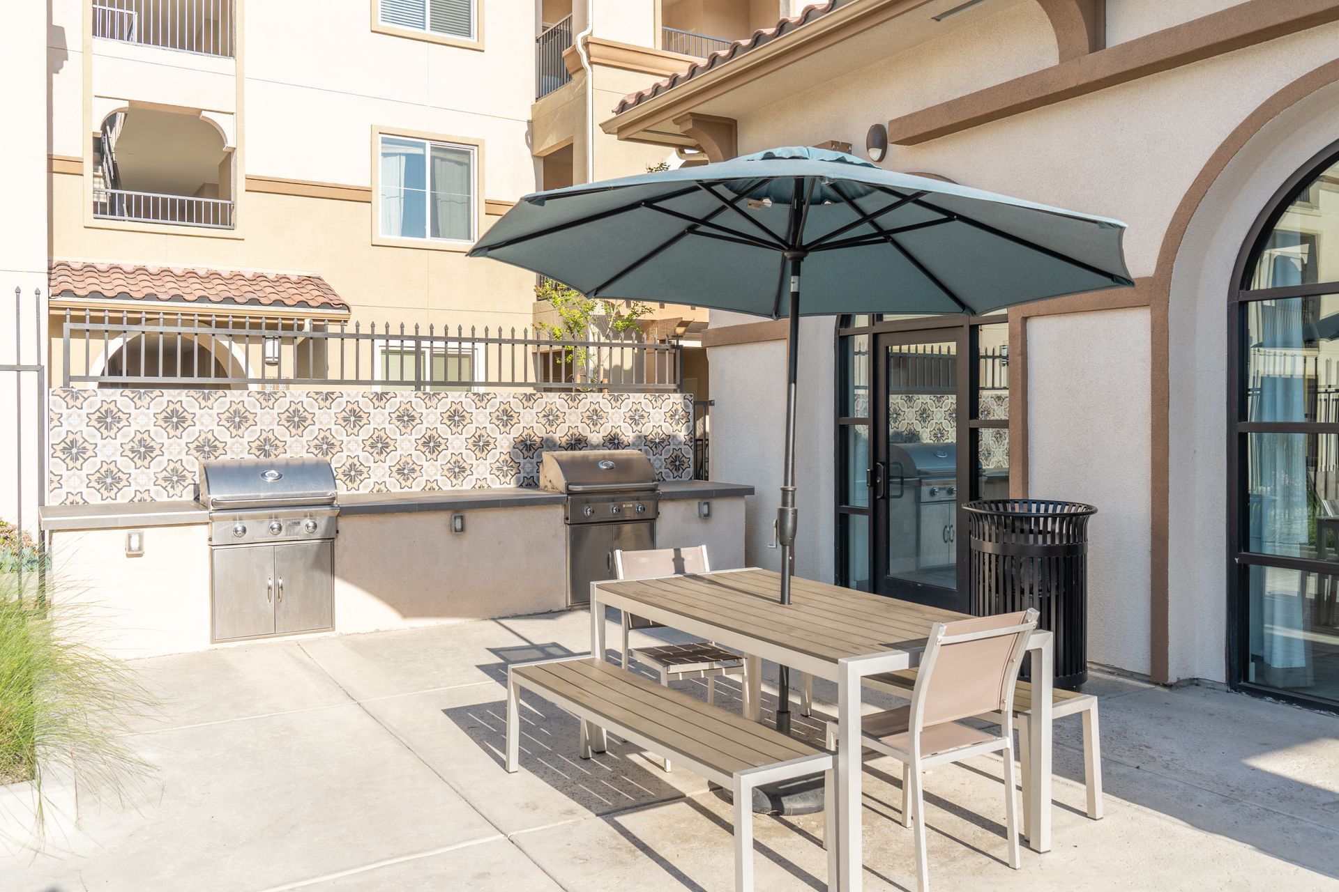 Picnic tables and chairs and BBQ