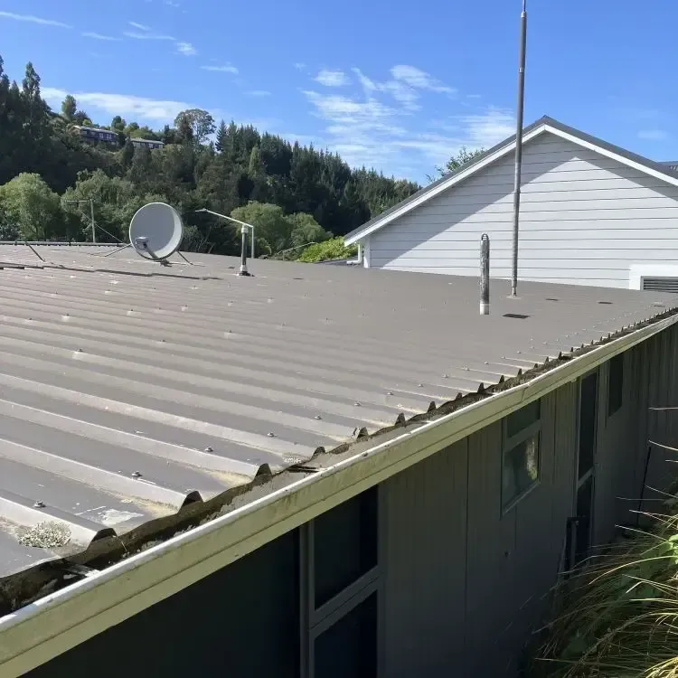 After: Cleaned roof gutters with all grass and debris removed. Kaikorai, Dunedin.