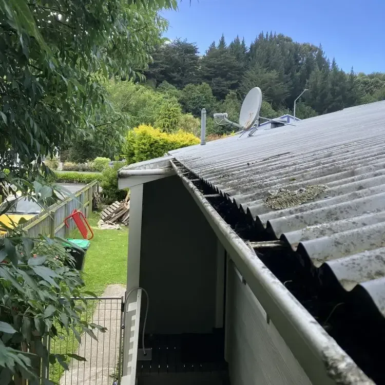 After: Clean roof gutter cleared of grass and debris after gutter cleaning, South Dunedin, Dunedin.
