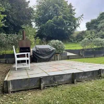 After: Landscaping maintenance and garden clean-up for a client's weed-covered paved patio area, St Clair.