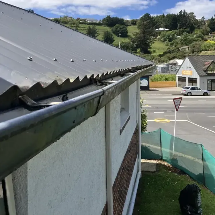 After: Clean roof gutter cleared of all grass and debris after cleaning, Kaikorai Valley, Dunedin.