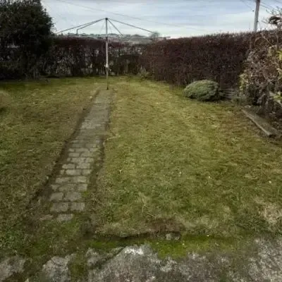 After: Lawn mowing and cutting services for a 50 square metre residential backyard in St Clair.