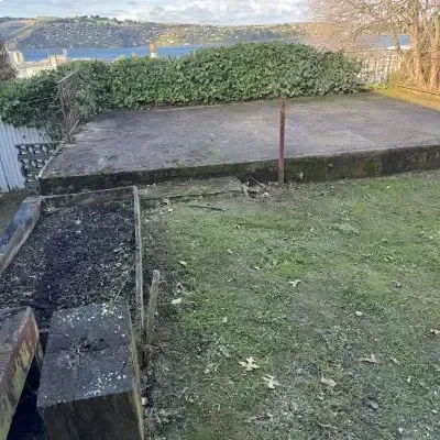 After: Backyard tidy up of overgrown grass and garden bed in Rosyln.