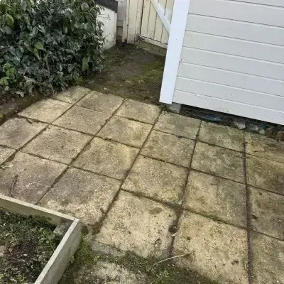 After: Weed and grass removal from a concrete paver patio in St. Clair.