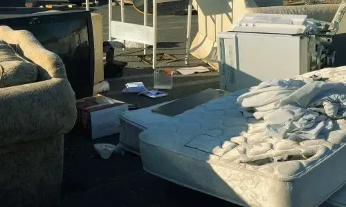 Mixed household rubbish load ready for removal in Dunedin, showing typical job size for pricing.