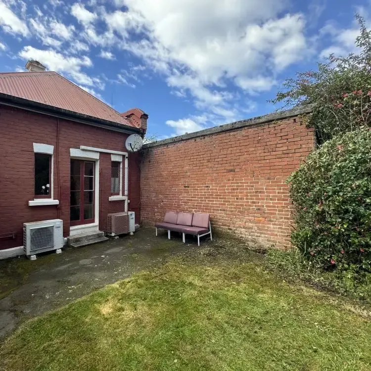 After: Section tidy-up and green waste removal in Opoho.