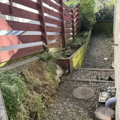 After: Side of a house overgrown with green waste clearance, removal of weeds and vegetation. St Clair.