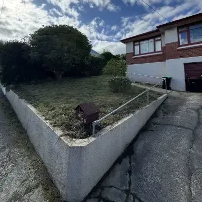 After: Front section clean up, removal of overgrown vegetation for a flat in St Clair.