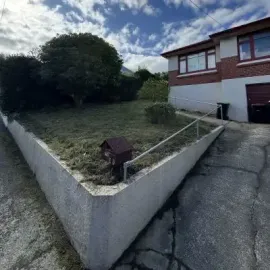 After: Front section clean up, removal of overgrown vegetation for a flat in St Clair.