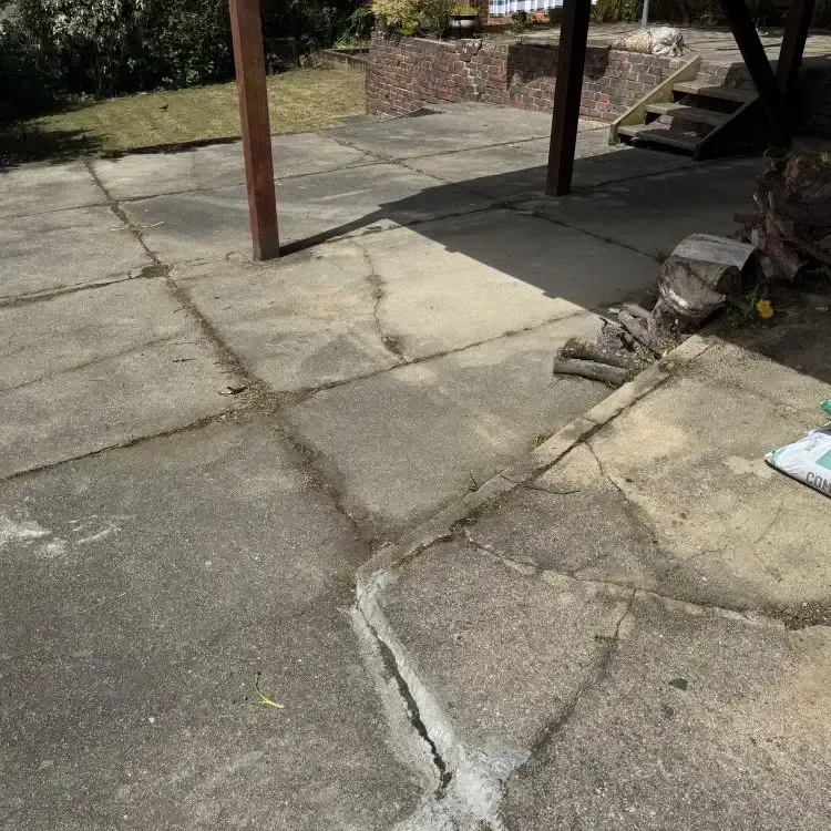 After: Grass and weed overgrowth from driveway cracks, wresulting in a weed-free driveway in Mosgiel, Dunedin.