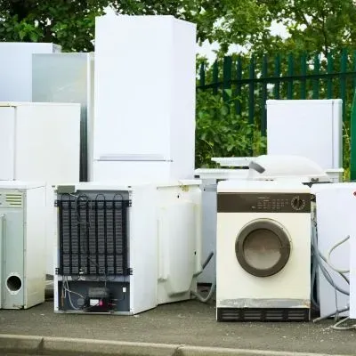 Old whiteware appliances such as fridges and washers are ready for removal in Mosgiel, Dunedin.