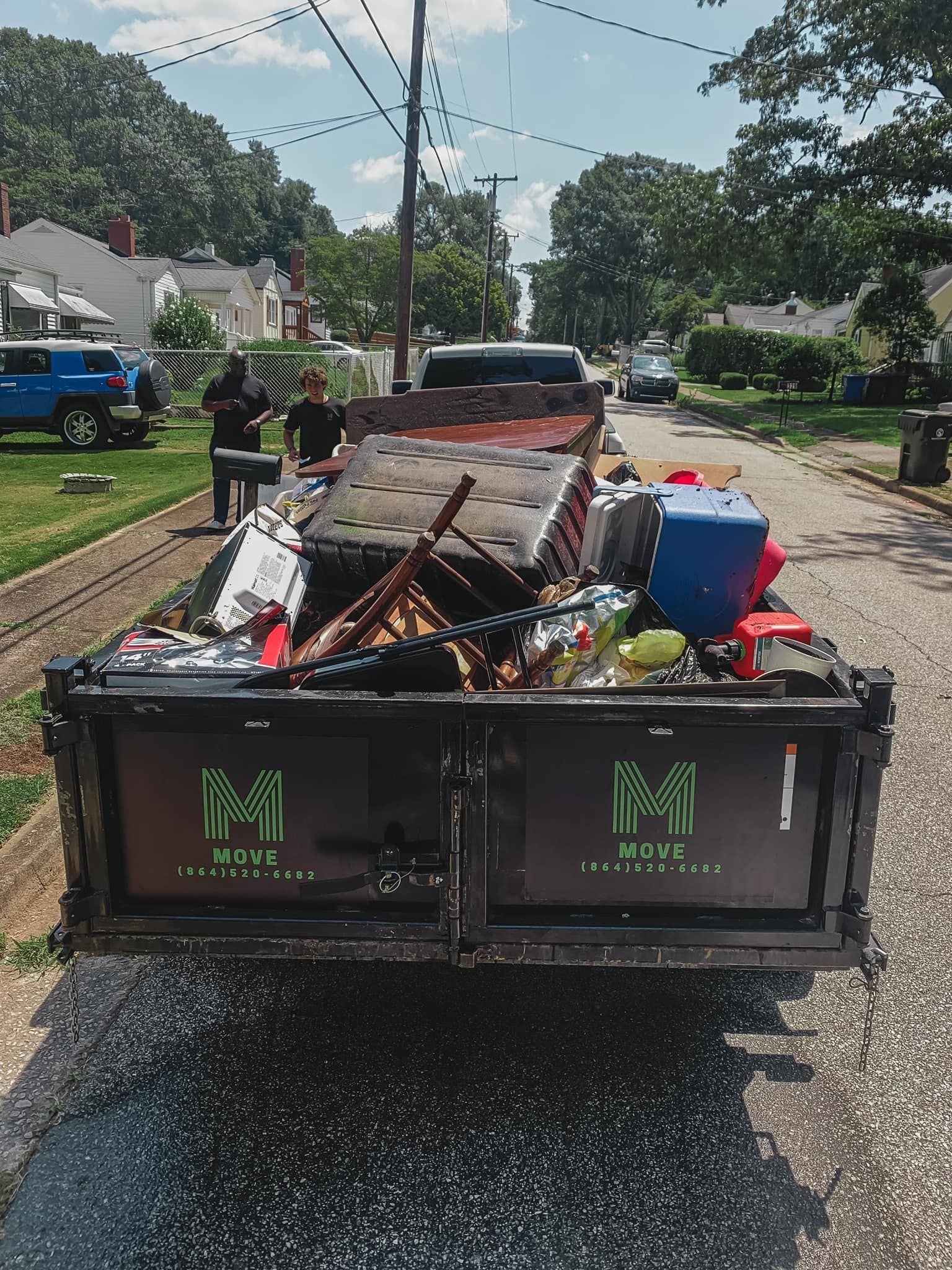 MOVE truck and trailer loaded on a job site