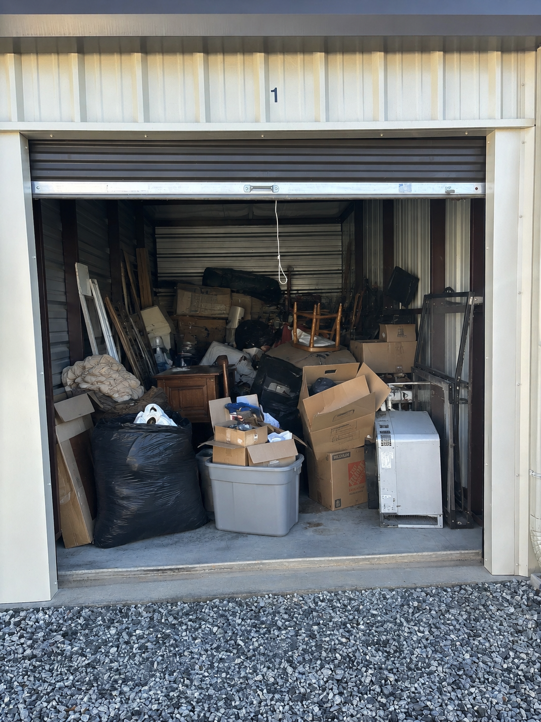 Before — cluttered space prior to junk removal