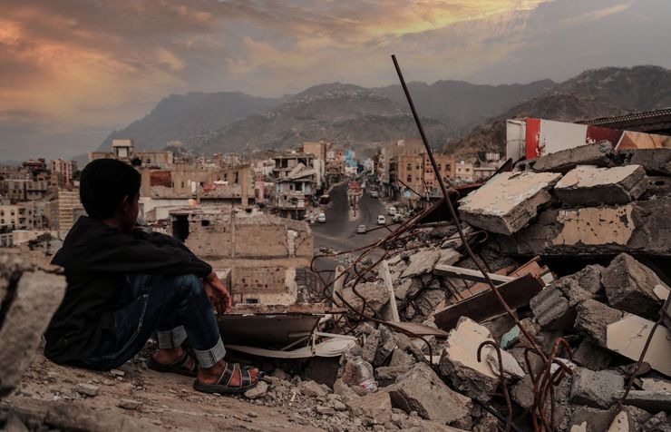 War news stories wartorn area with child