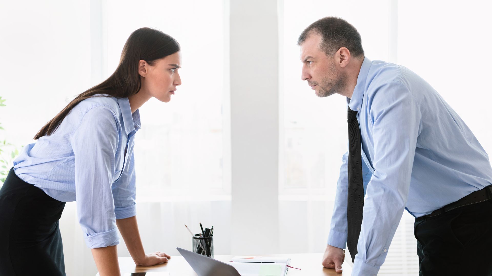 Conflict at work man and woman