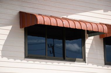 a house window with awning