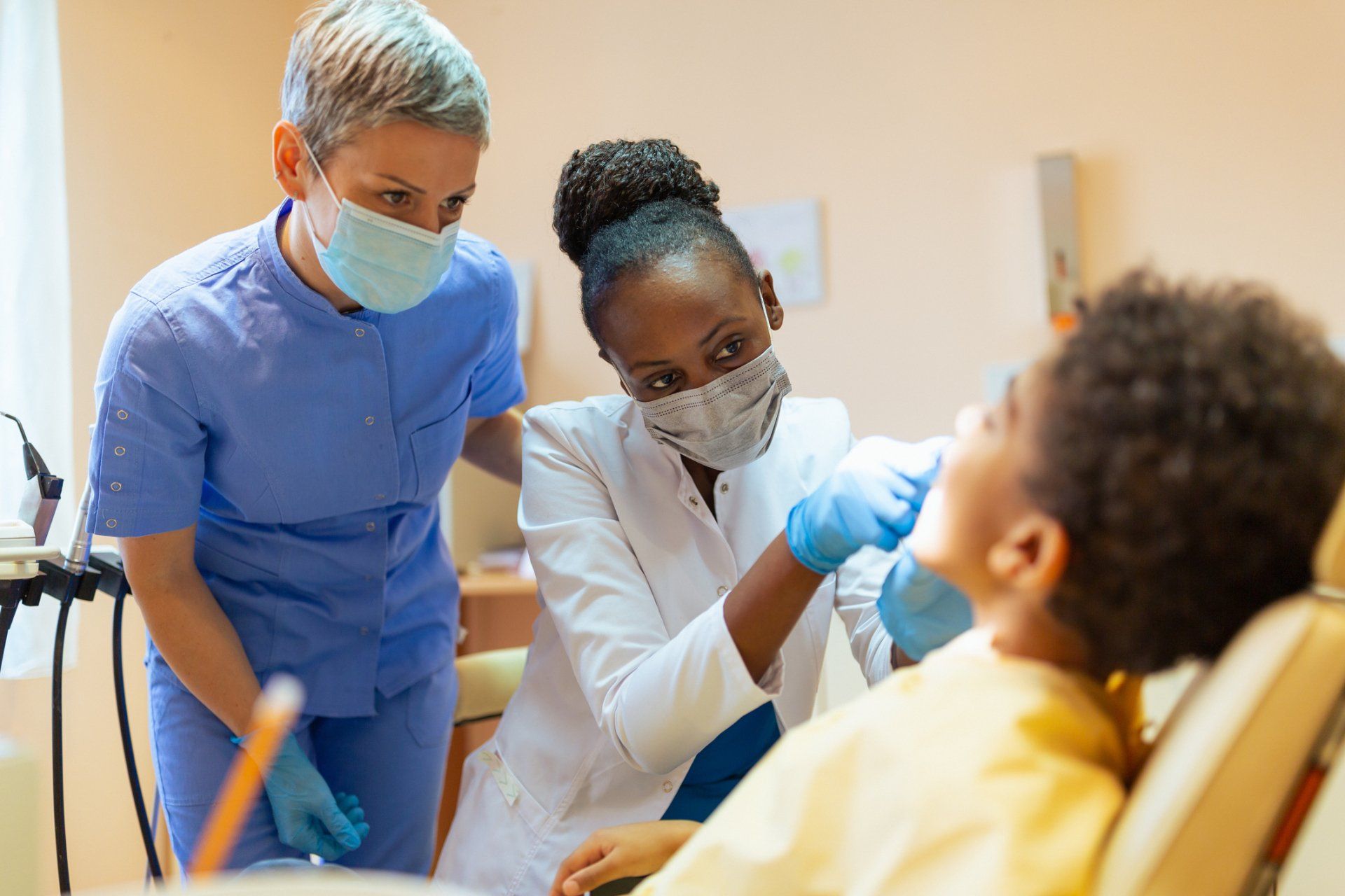 Black Female Dentist Doing Dental Check Up - West Carrollton, OH - DATS Dental Assistant School LLC