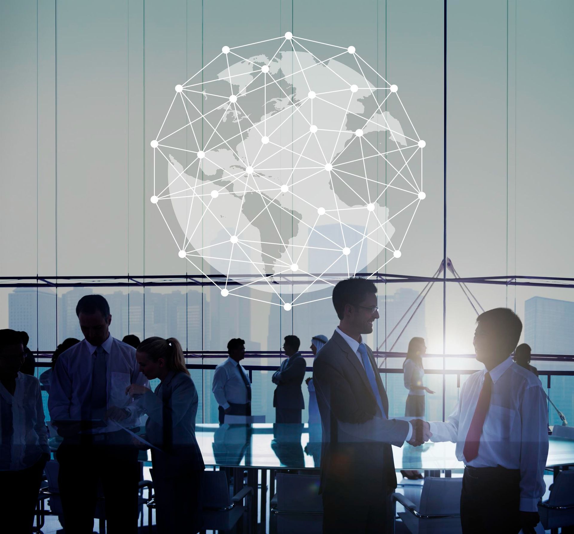 A group of people standing in front of a globe.