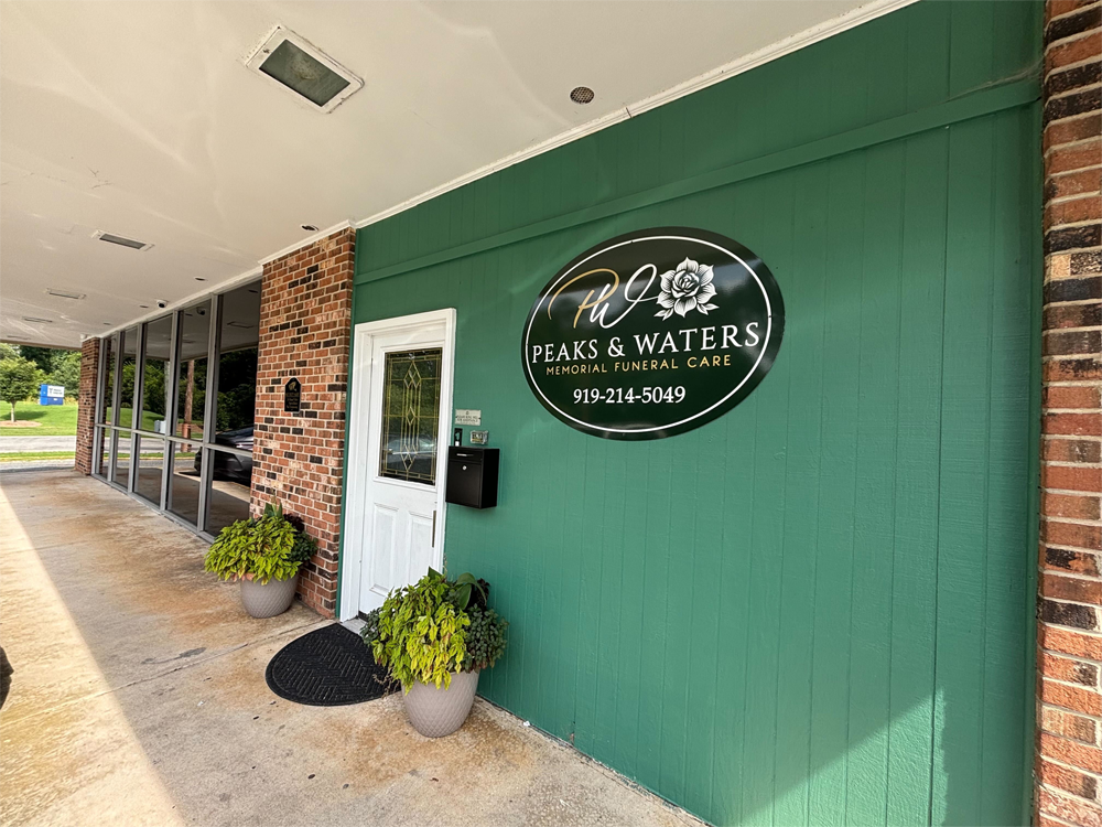 Peaks & Waters Memorial Funeral and Cremation Care Building and Logo