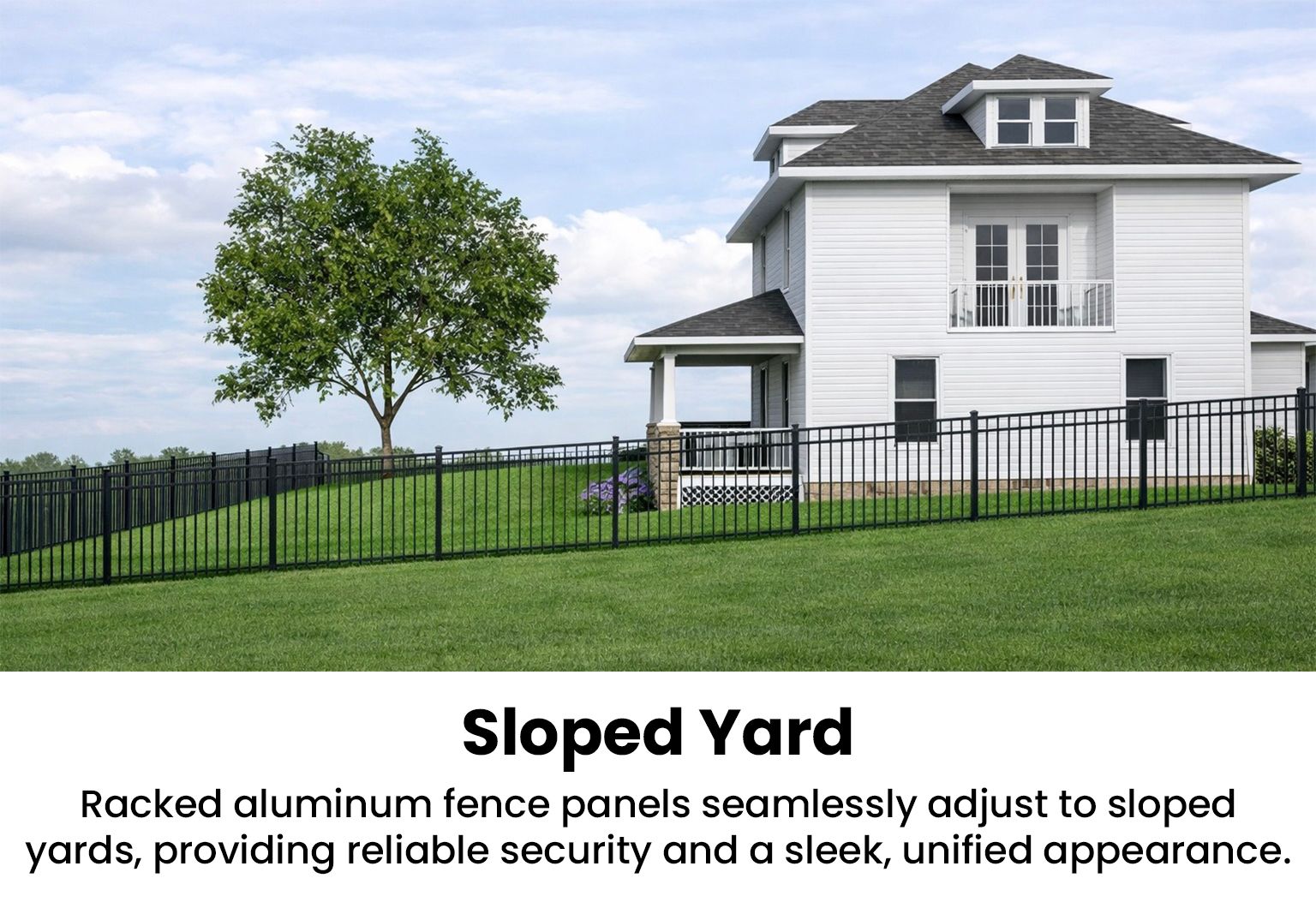 Black aluminum fence on a sloped yard around a white house with a tree.