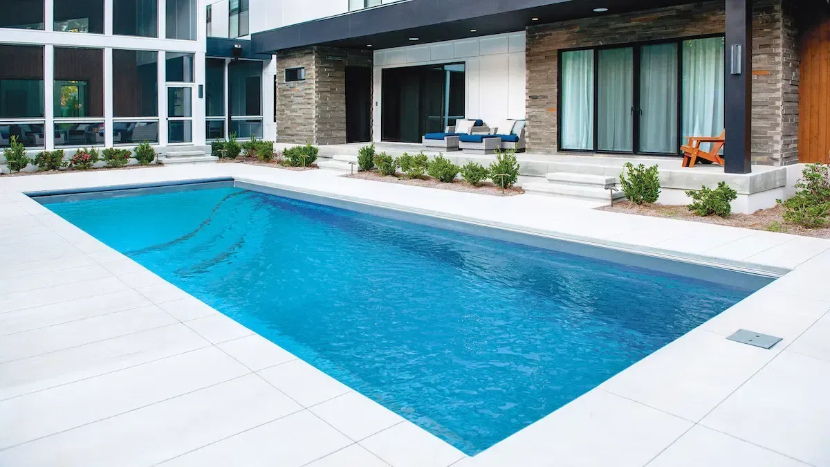 The Bliss Pool Range Layout in the Ocean Blue Pool Color installed by Poor Boy.
