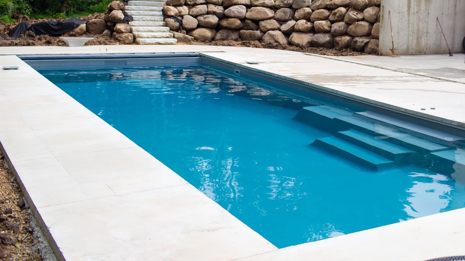 The Celebration Pool Range showing steps and perfectly crafted pool perimeter