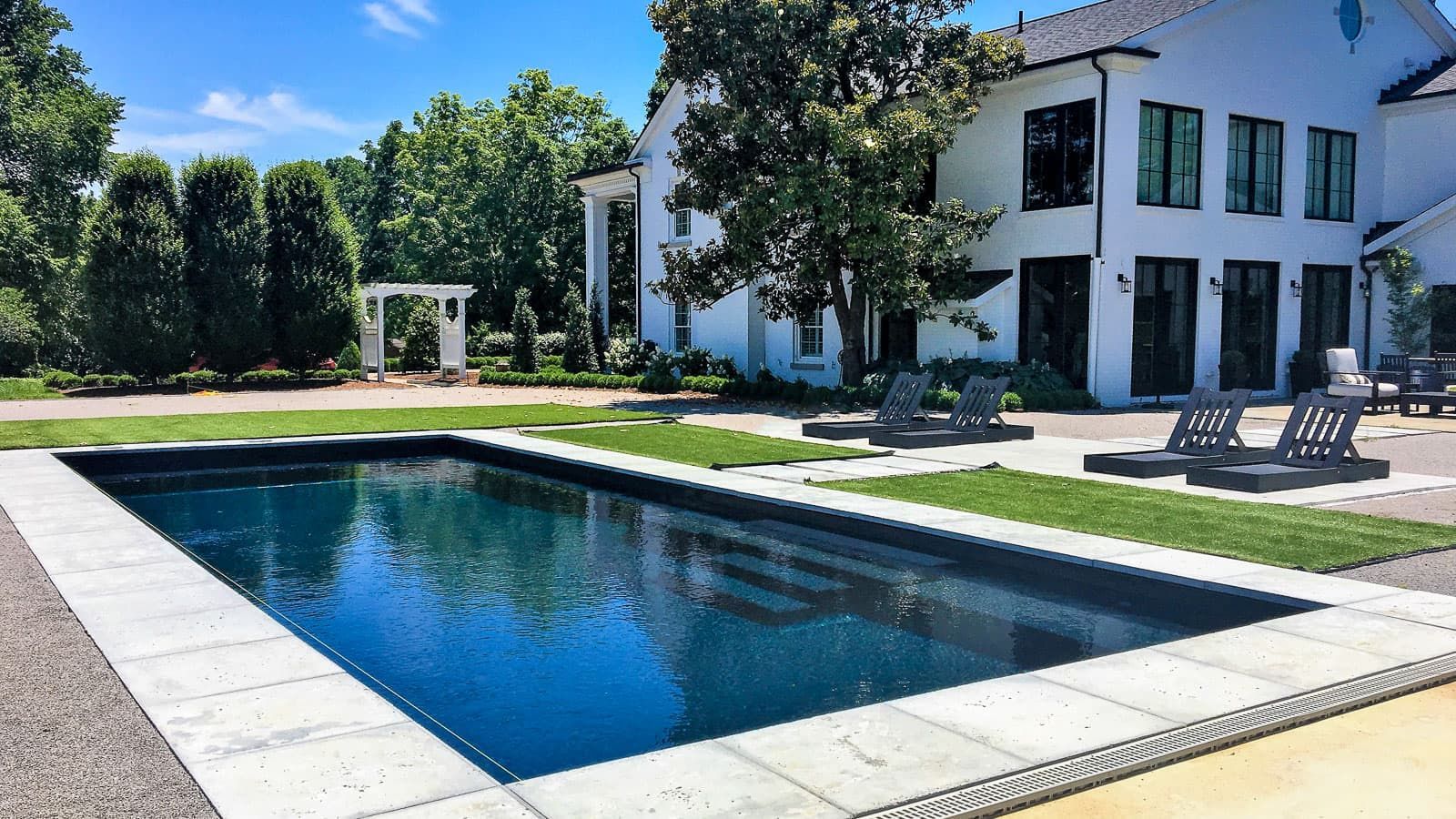 The Celebration Pool Layout with Volcanic Black Pool Color