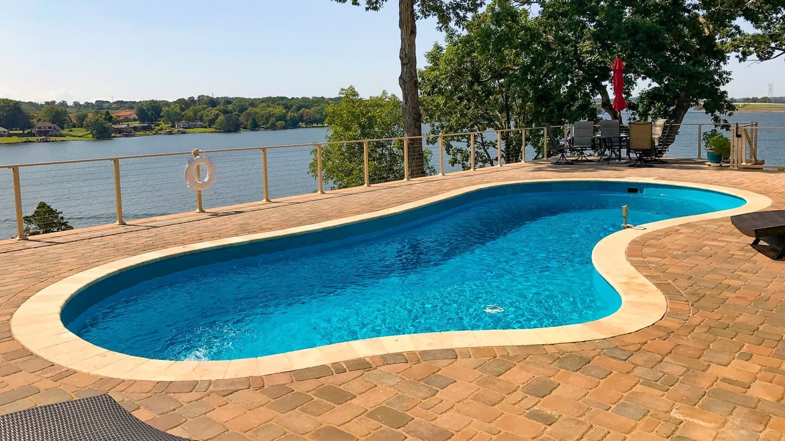 The Inspiration Pool Range beside a natural body of water. 