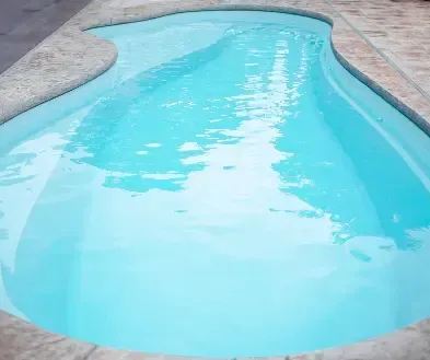 Lifestyle image of the Seaside Sky Pool Color in a pool. 