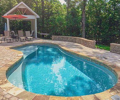 Storm Grey Pool Color Interior lifestyle image shown in a Poor Boy Pool Installation